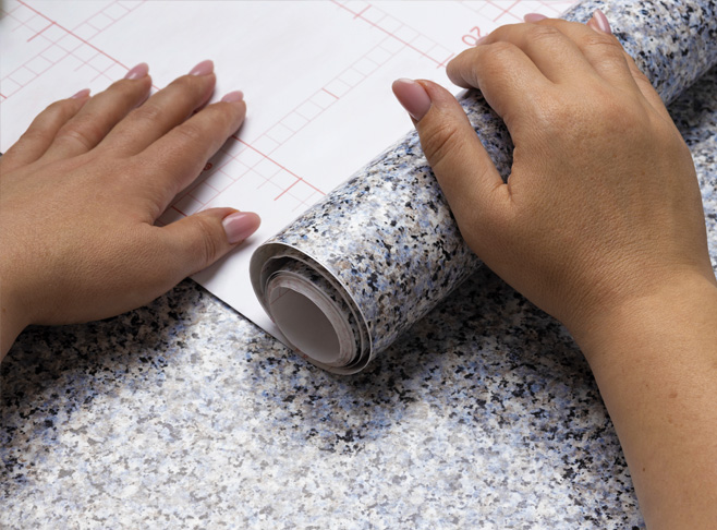 Pose d'adhésif meubles cuisine à Paris